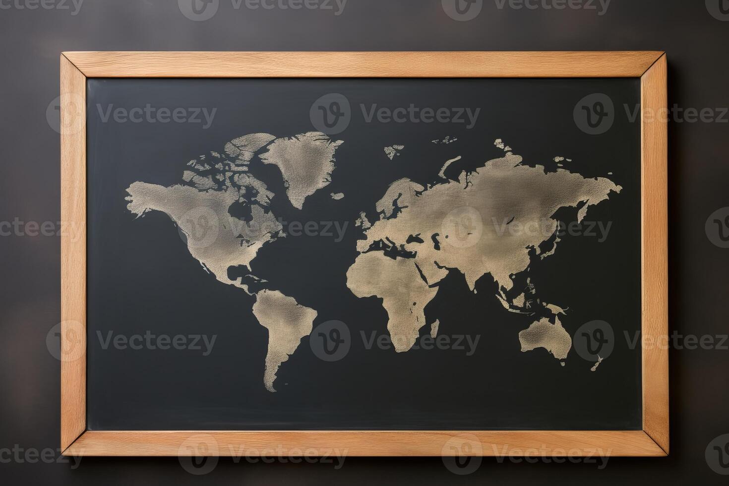 Golden world map showing continents on blackboard in classroom setting for geography lesson photo