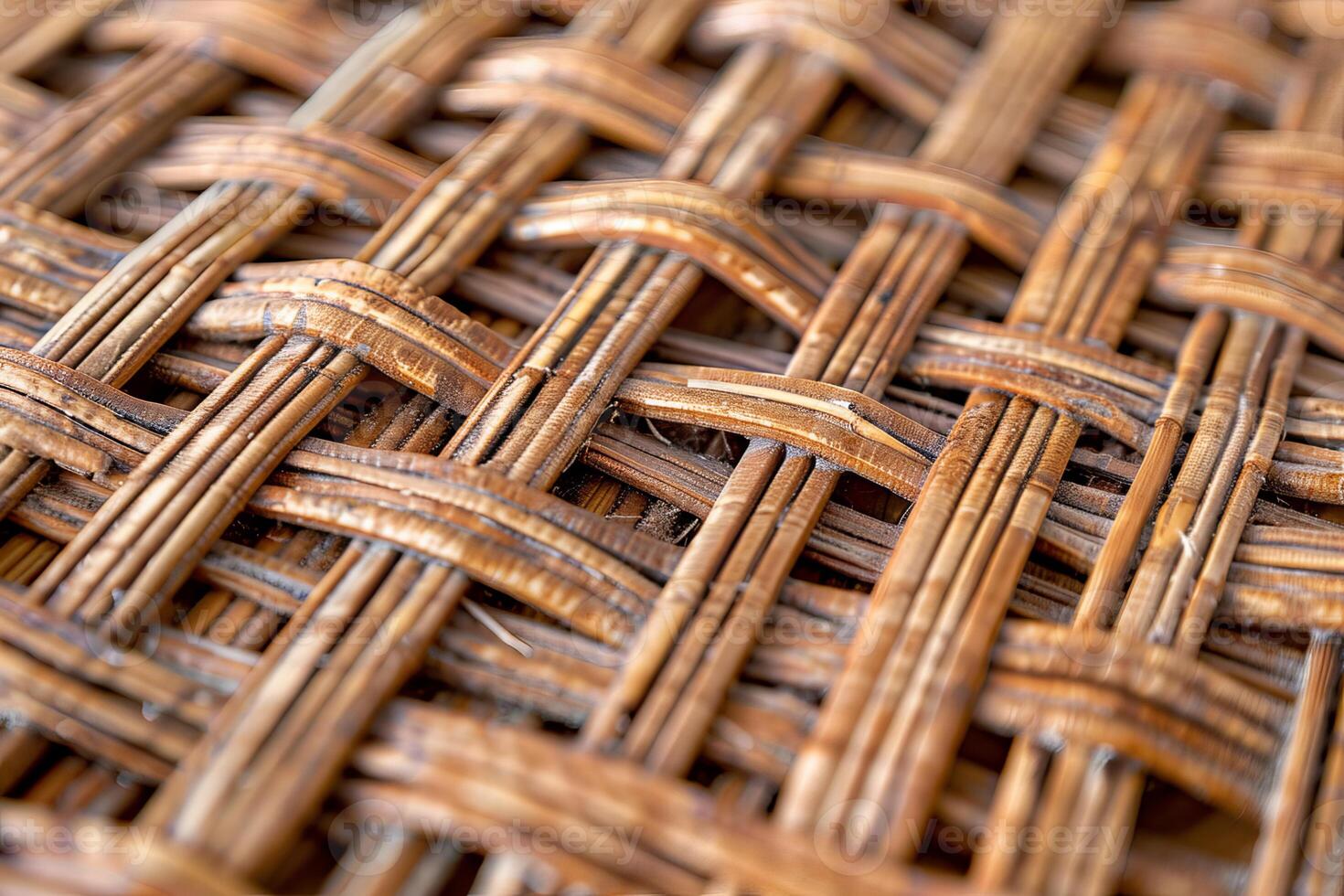 Interlaced straw creating textured pattern in handmade basket weaving photo