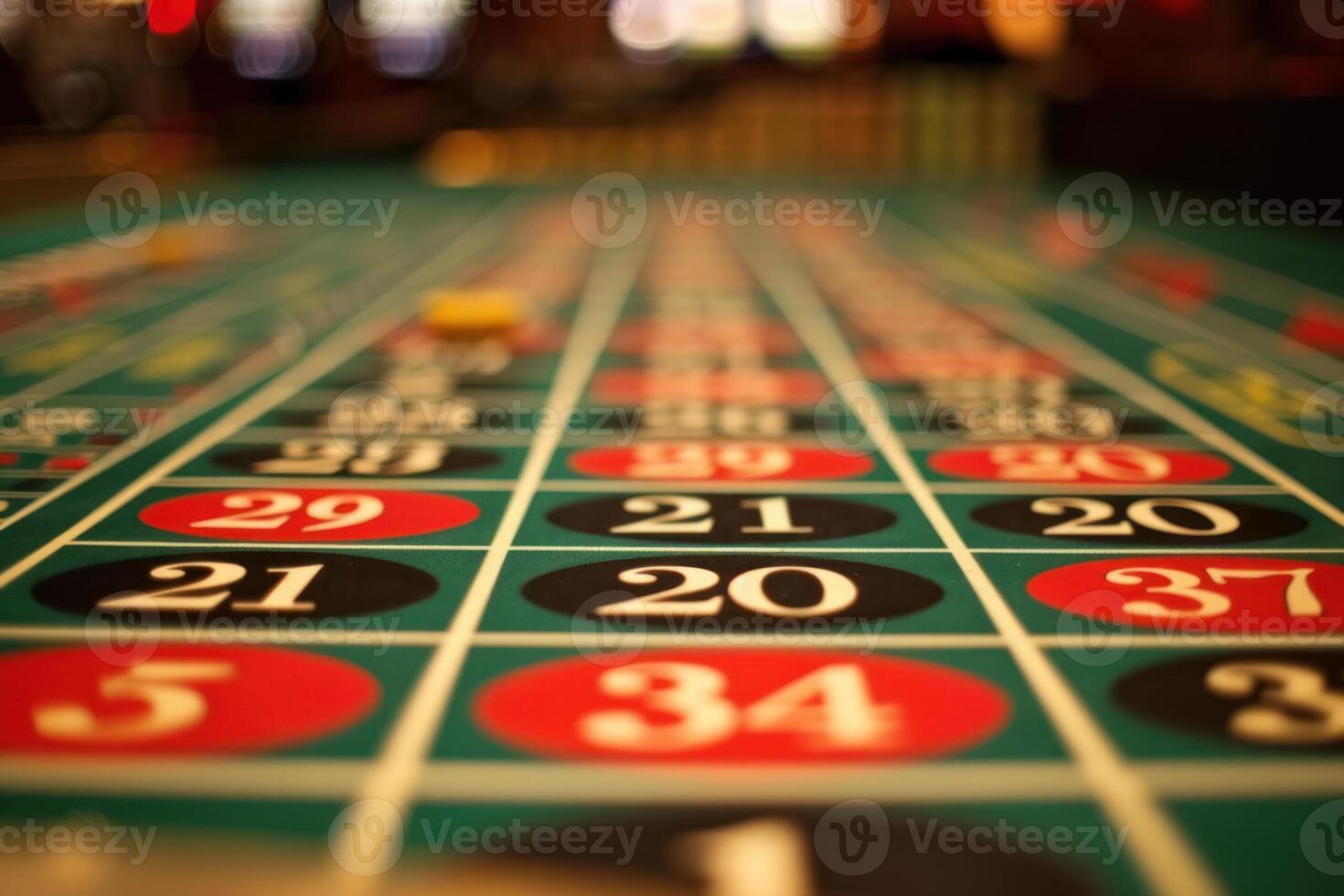 Roulette table showing numbers and yellow chip in casino photo