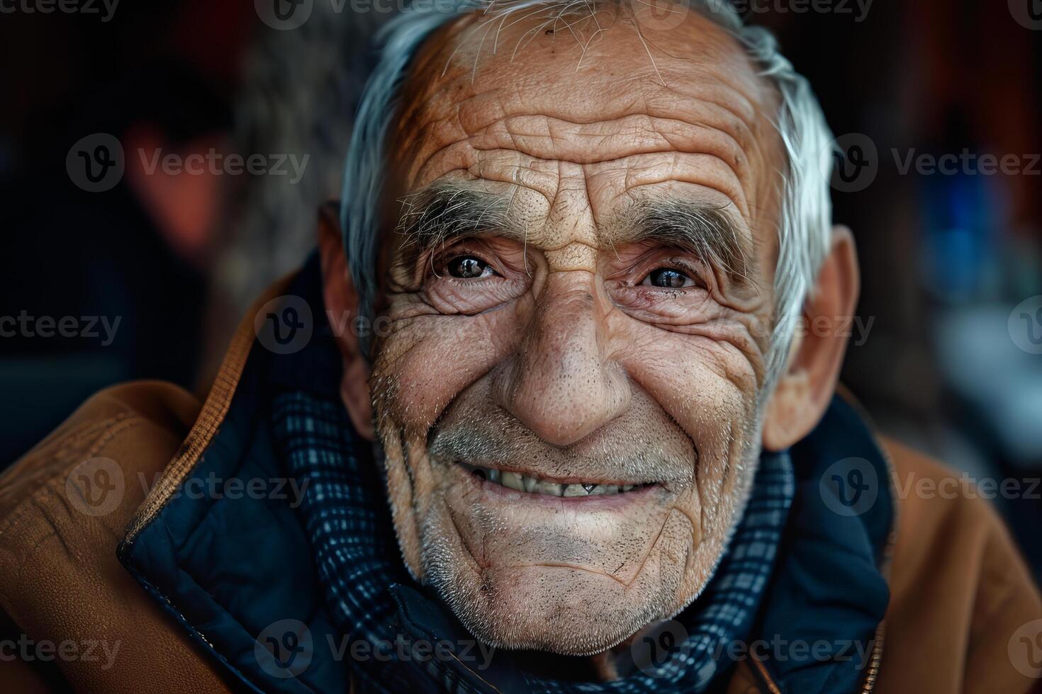 Portrait of smiling senior man showing happiness and wisdom photo