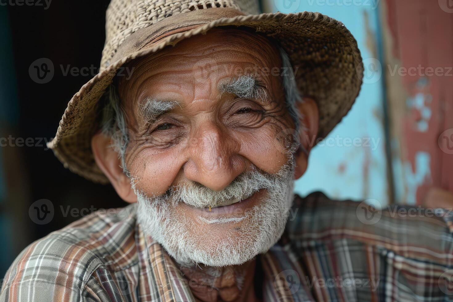 Portrait of an old man in a straw hat photo