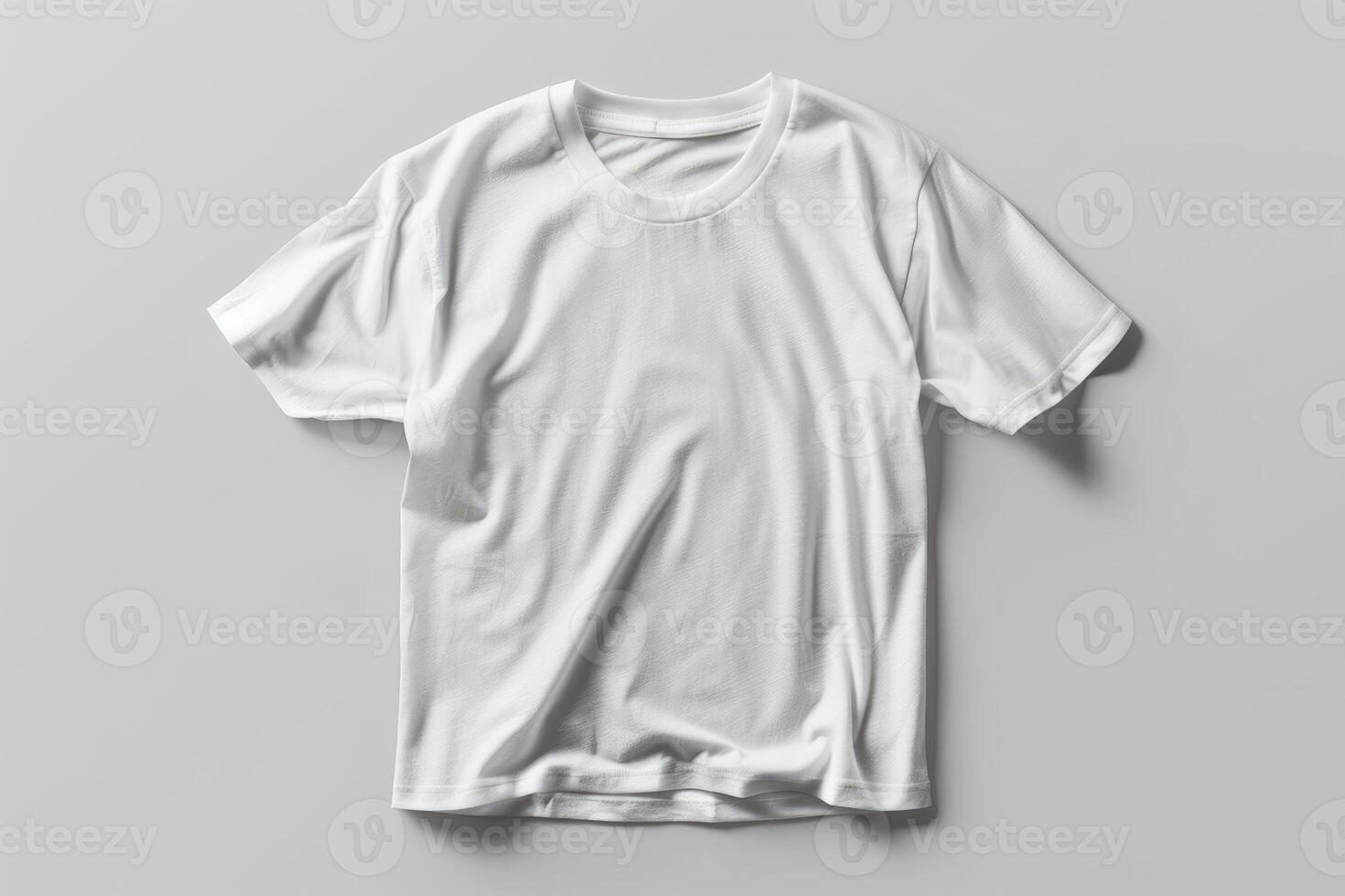 Basic white t shirt lying flat on gray background photo