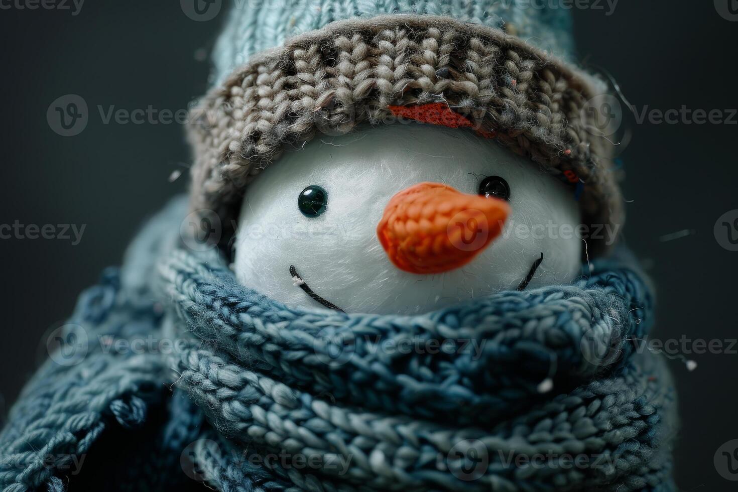 Smiling snowman toy wearing knitted scarf and hat embraces winter charm photo