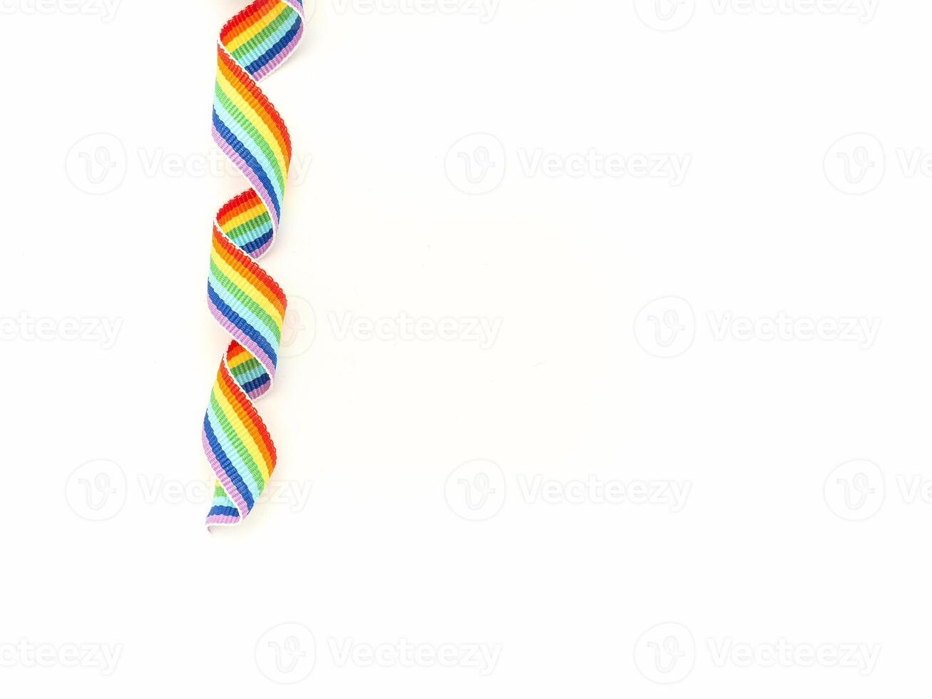 Top view of the rainbow cloth ribbon on a white background. photo