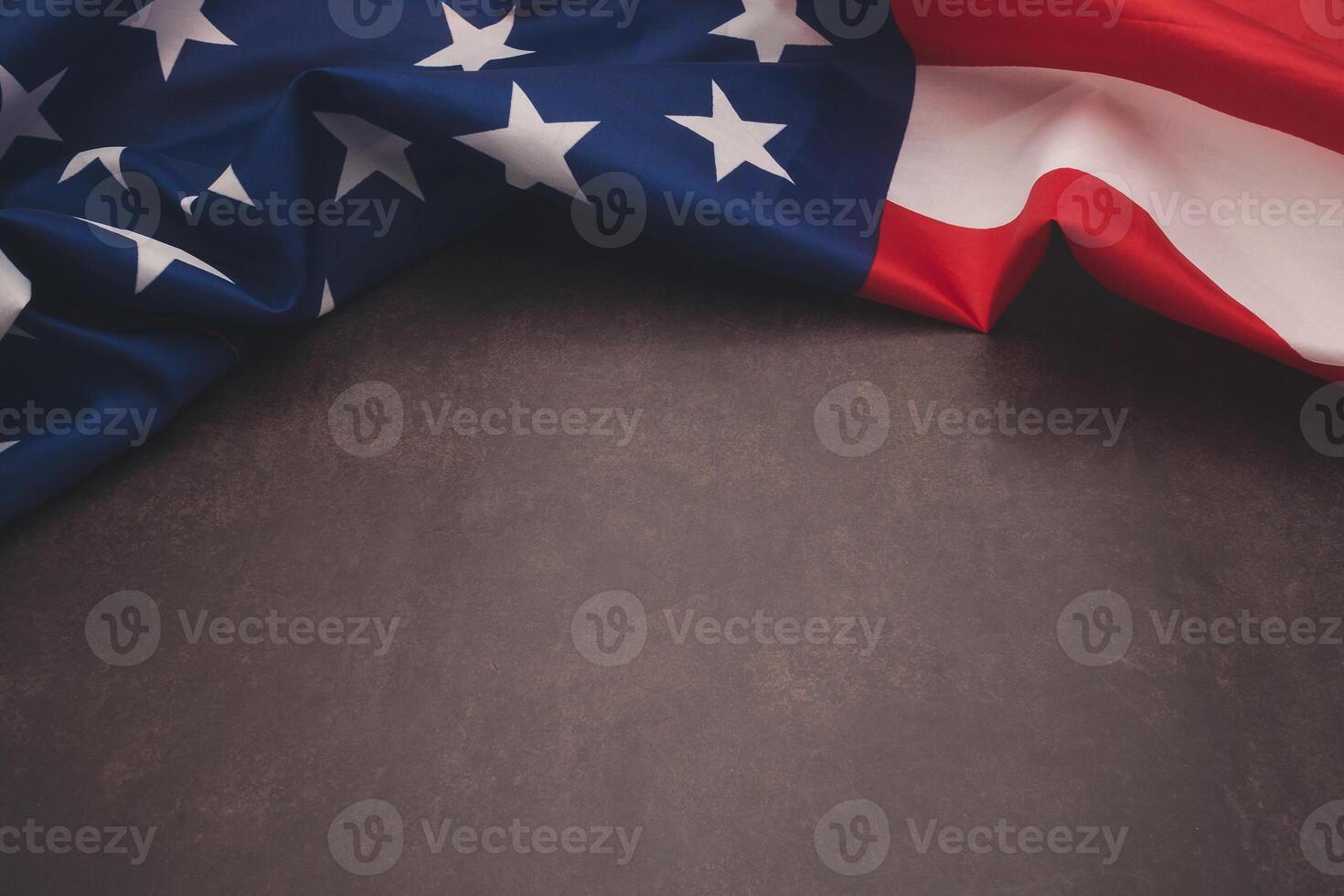 Part of the American flag is on a vintage background with copy space for text. Flat lay. photo