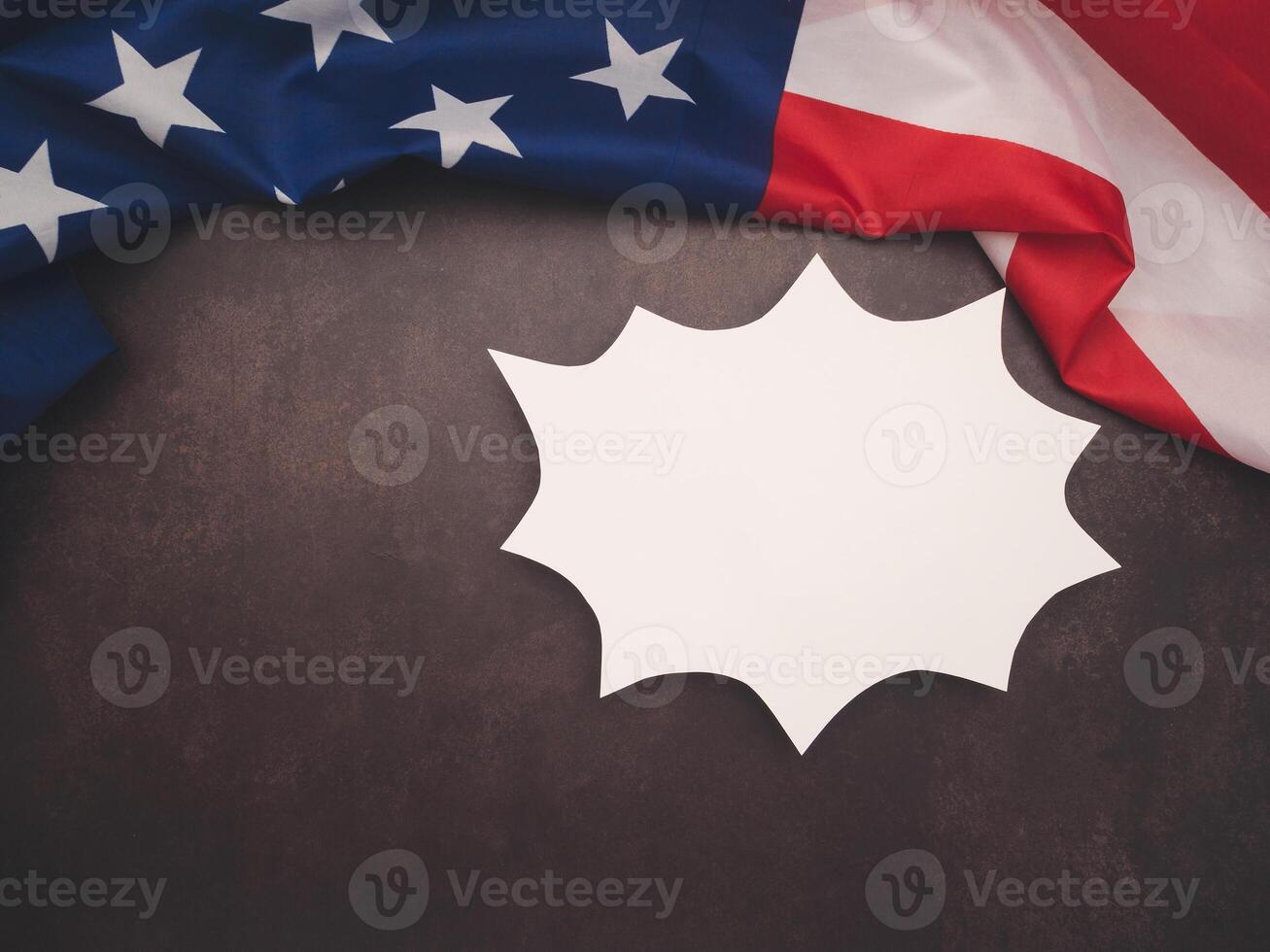 Part of the American flag and a white comic speech bubble on a vintage background photo