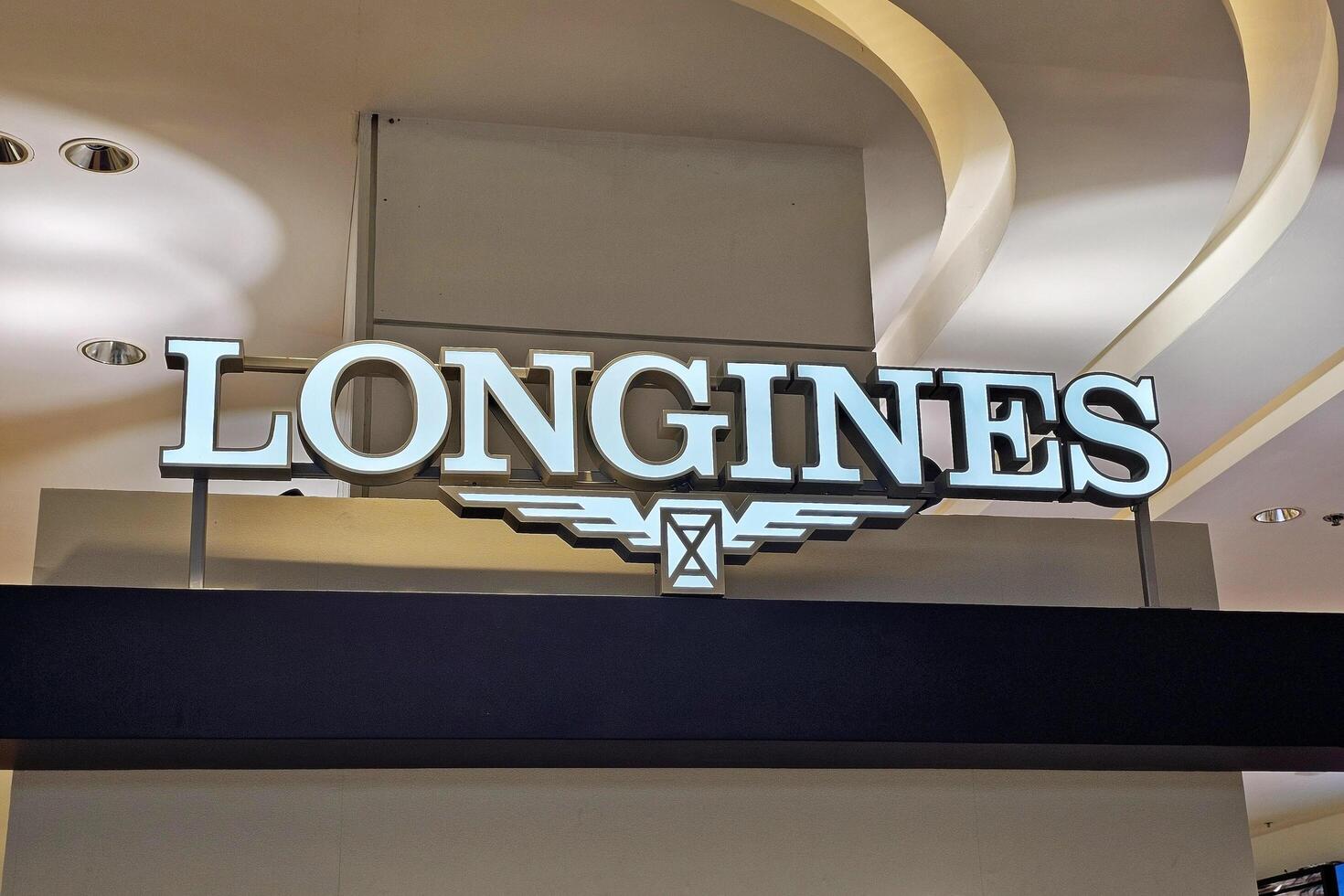 Bangkok, Thailand April 21, 2024 Longines sign. Longines is a swiss luxury watchmaker that was founded in 1832 by Auguste Agassiz. photo