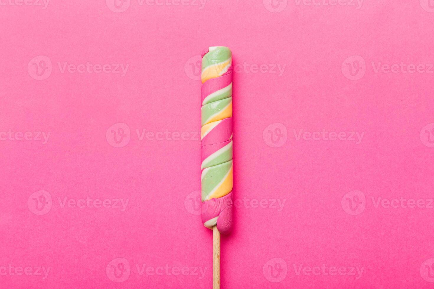 Colorful candies, lollypop the colorful background, multicolored minimal style top view photo