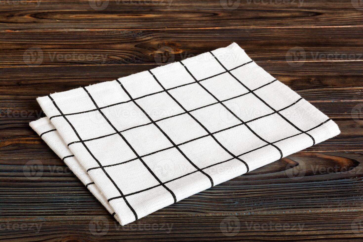 top view white empty kitchen napkin isolated on table background. Folded cloth for mockup with copy space, Flat lay. Minimal style photo