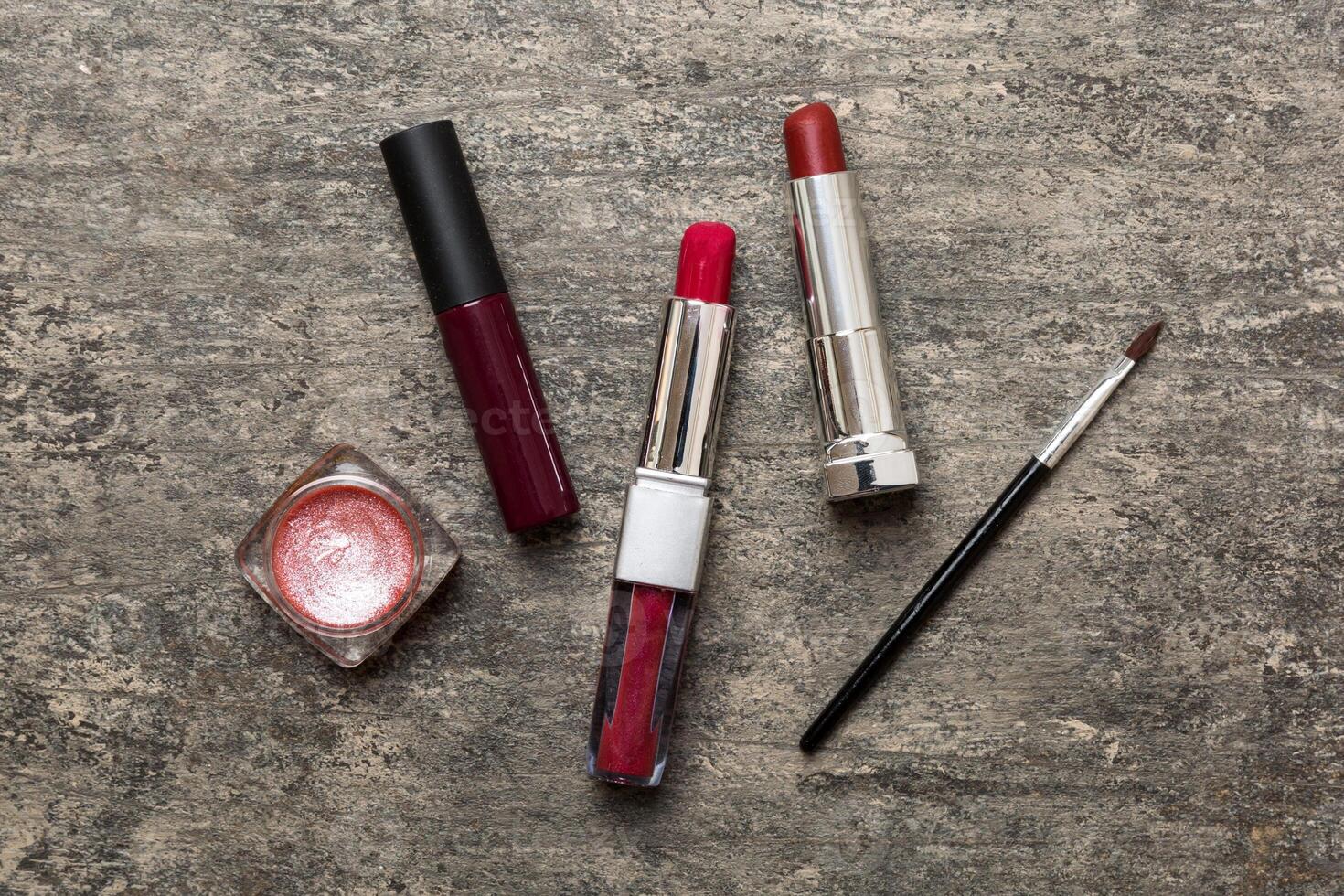 Professional makeup tools. Flat lay. Beauty, decorative cosmetics. Makeup brushes set and color eyeshadow palette on table background. Minimalistic style photo