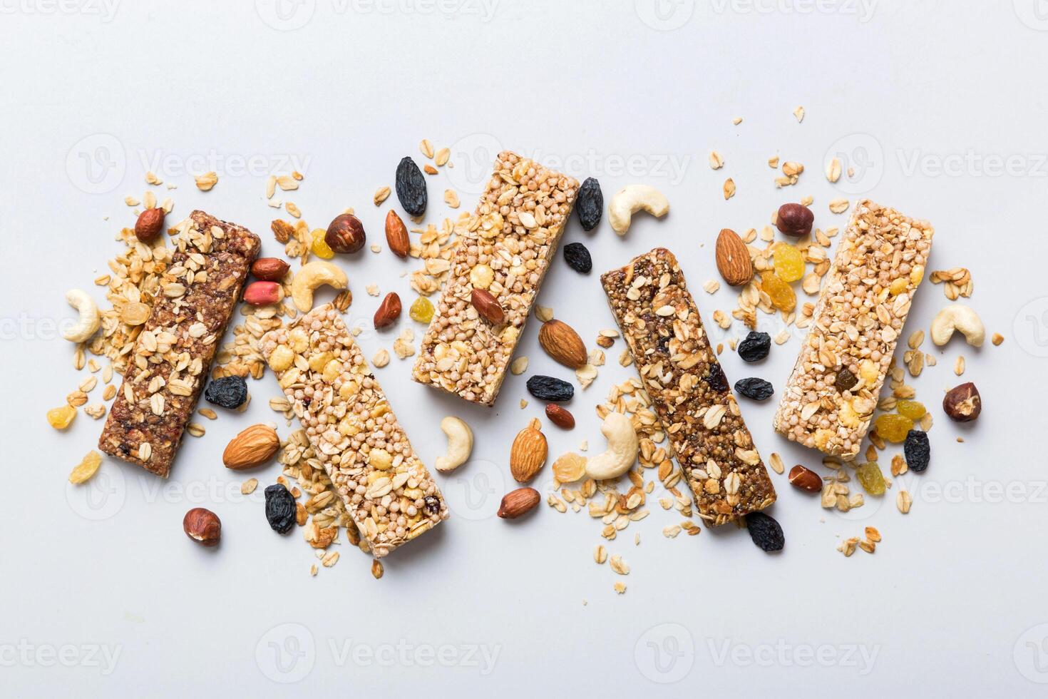 Various granola bars table background. Cereal granola bars. Superfood breakfast bars with oats, nuts and berries, Superfood concept photo