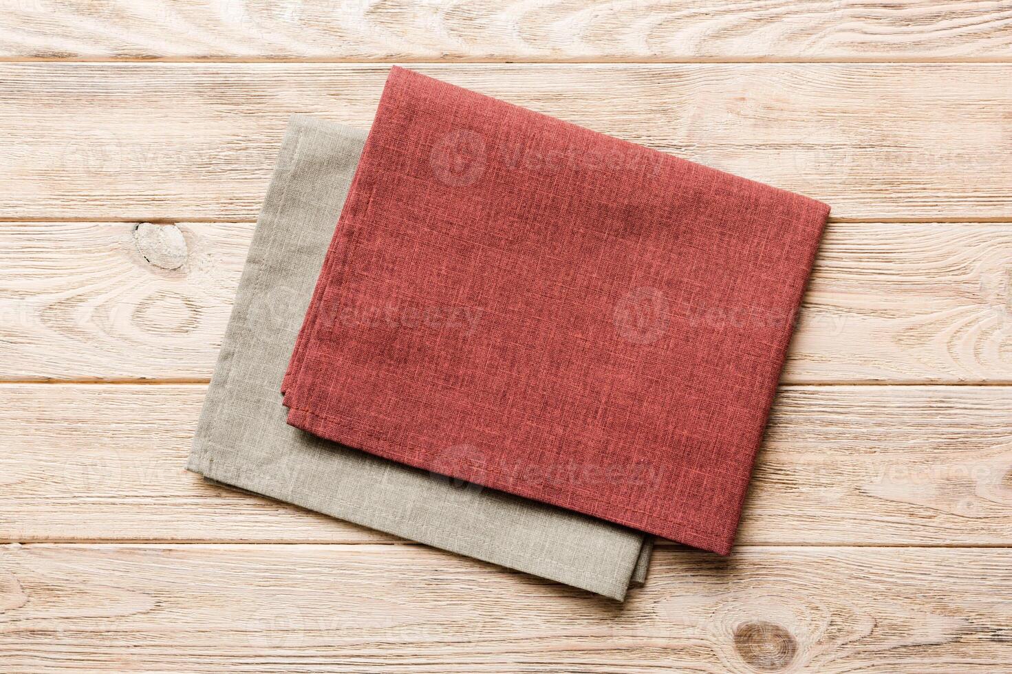 top view red empty kitchen napkin isolated table background. Folded cloth for mockup with copy space, Minimal style photo