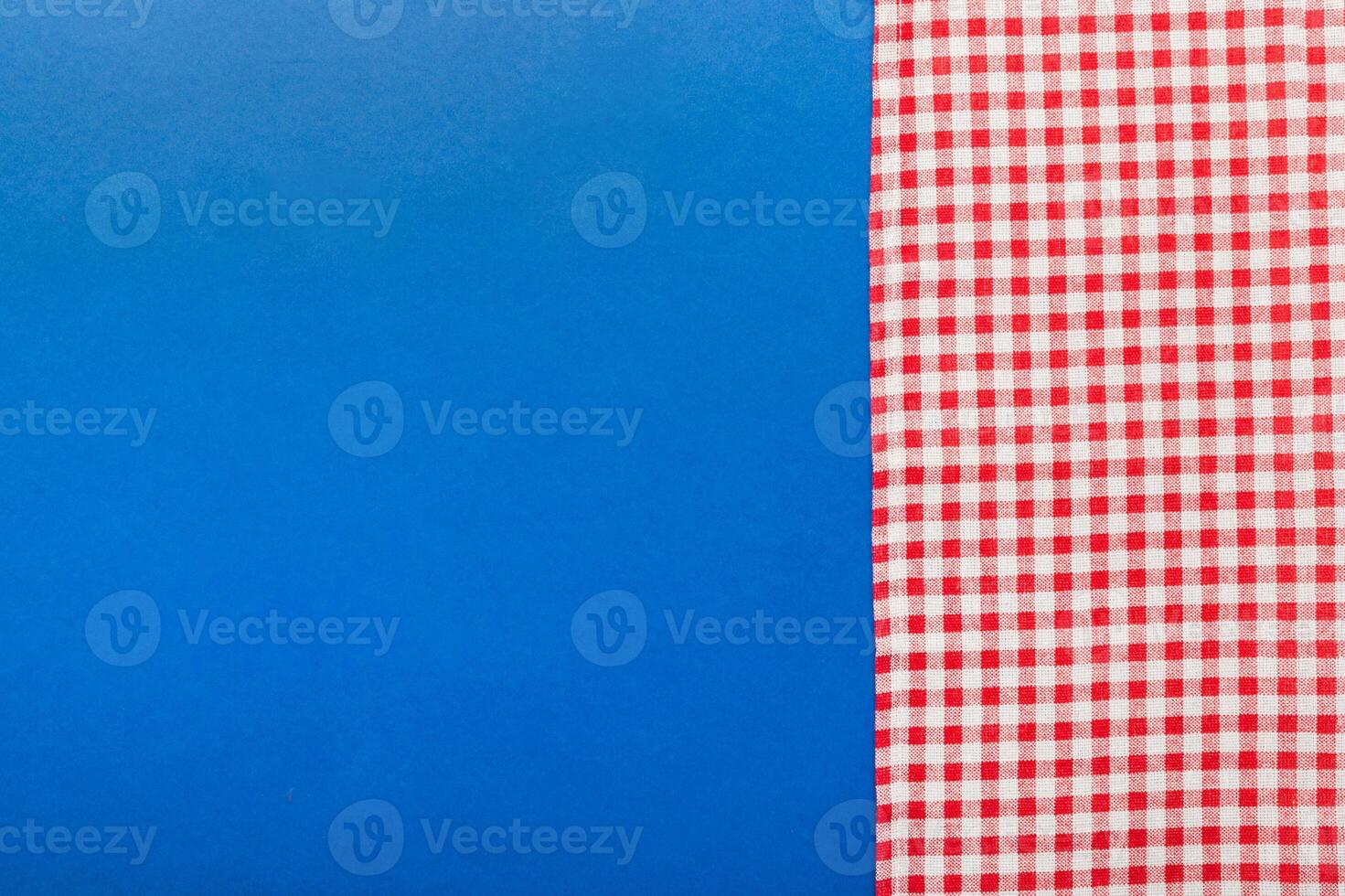 top view with red empty kitchen napkin isolated table background. Folded cloth for mockup with copy space, Flat lay. Minimal style photo