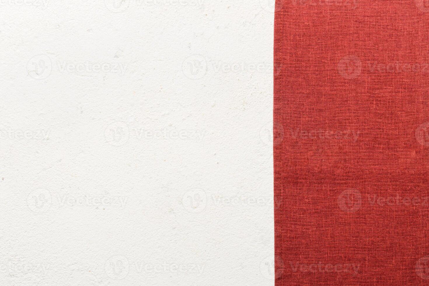 top view with red empty kitchen napkin isolated on table background. Folded cloth mockup with copy space. Minimal style photo