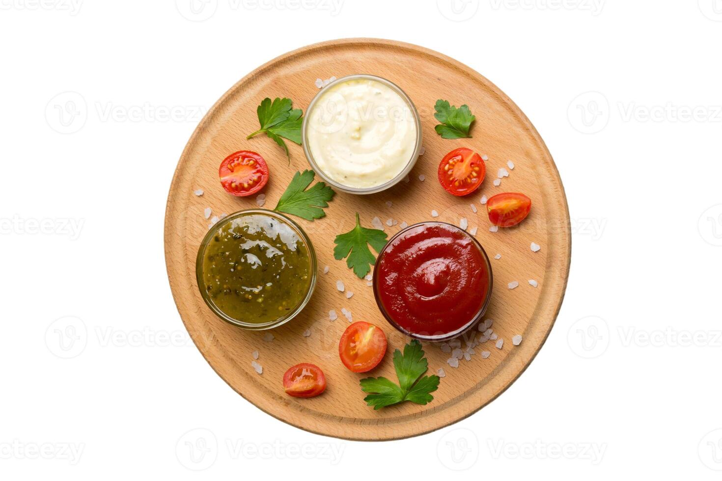 Many different sauces herbs isolated white background, flat lay top view. sauces on plate, healthy concept photo