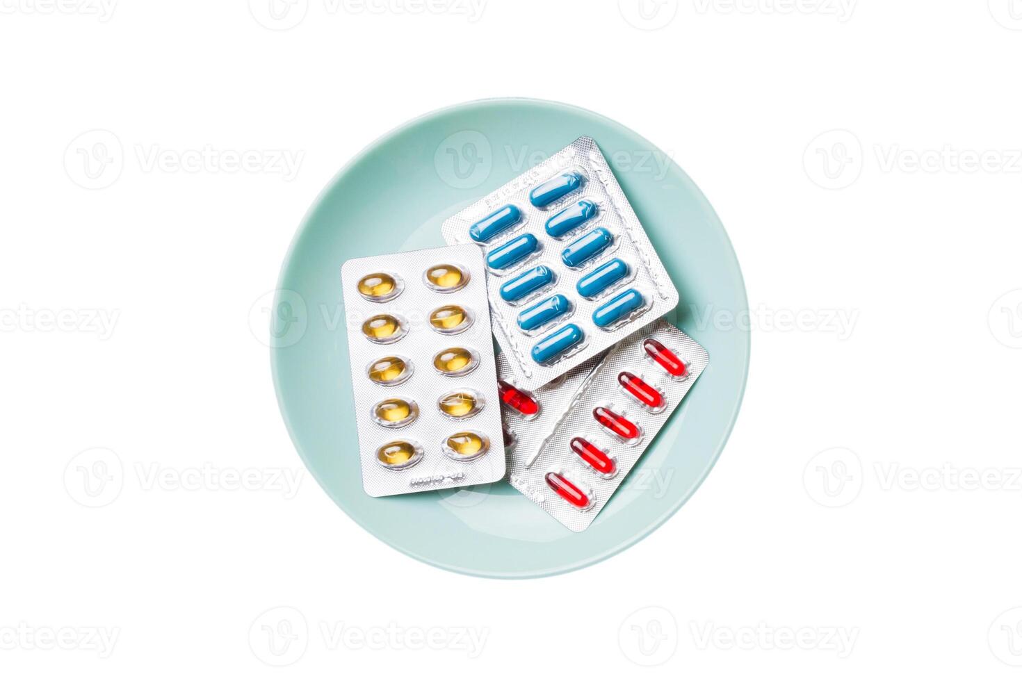 Many different weight loss pills and supplements as food on round plate. Pills served as a healthy meal. Drugs, pharmacy, medicine medical healthycare concept photo