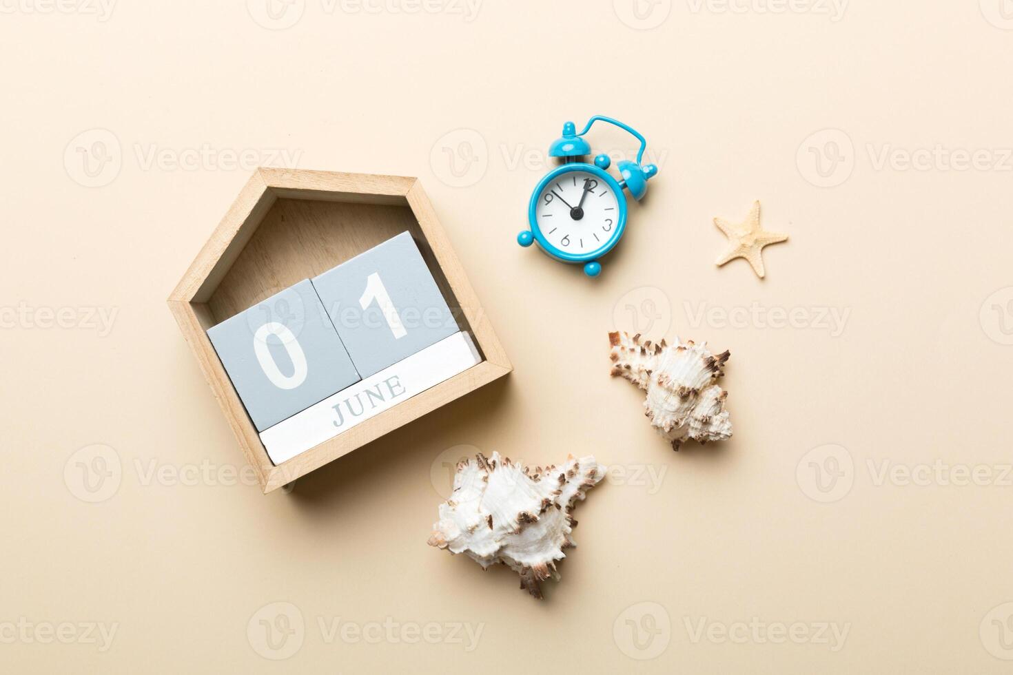 June 1th. Image of june wooden calendar on colored background. Summer day. Empty space for text photo