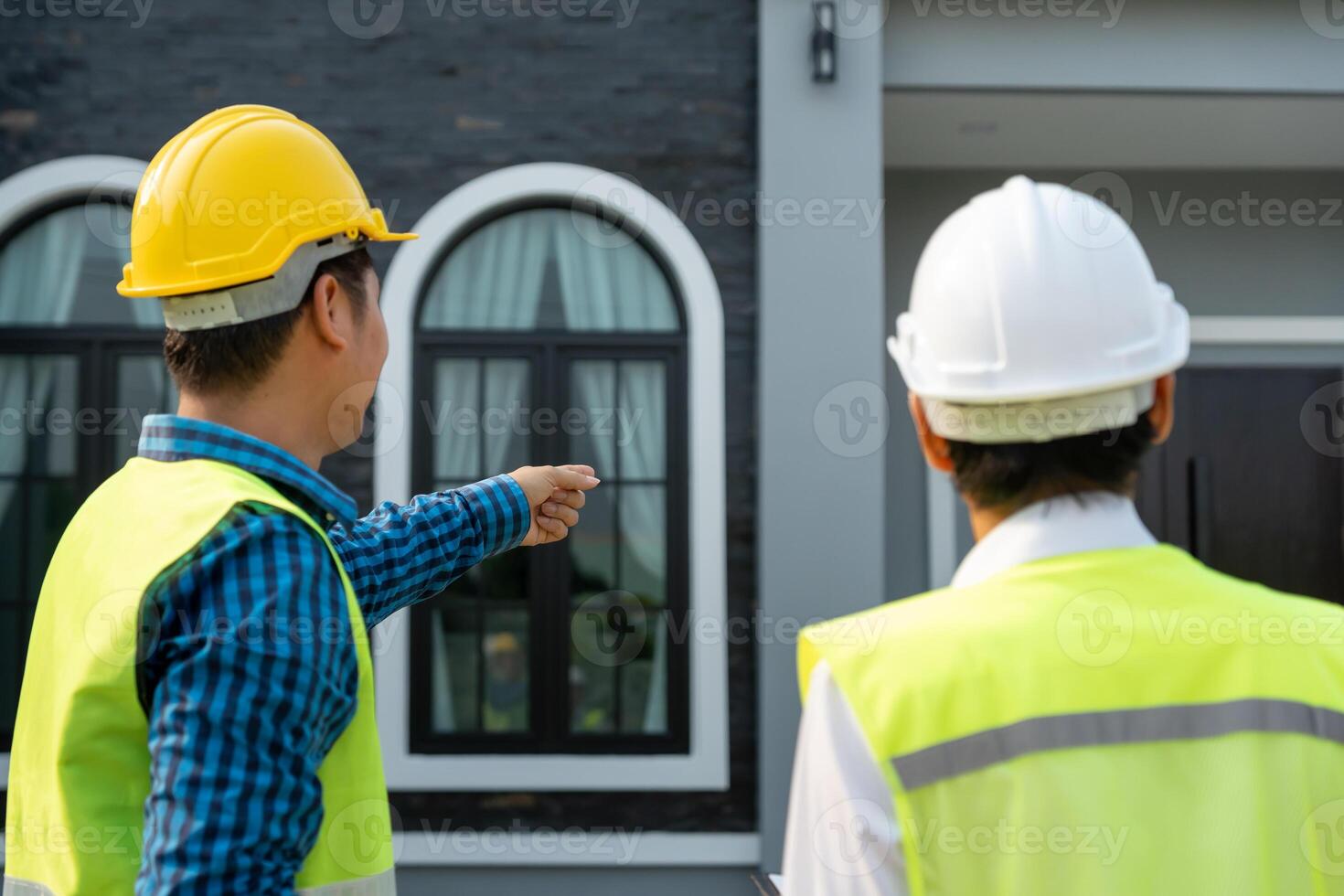 inspector engineer project is inspecting construction and quality assurance new house. Engineers or architects or contactor work to build the house before handing it over to the homeowner photo