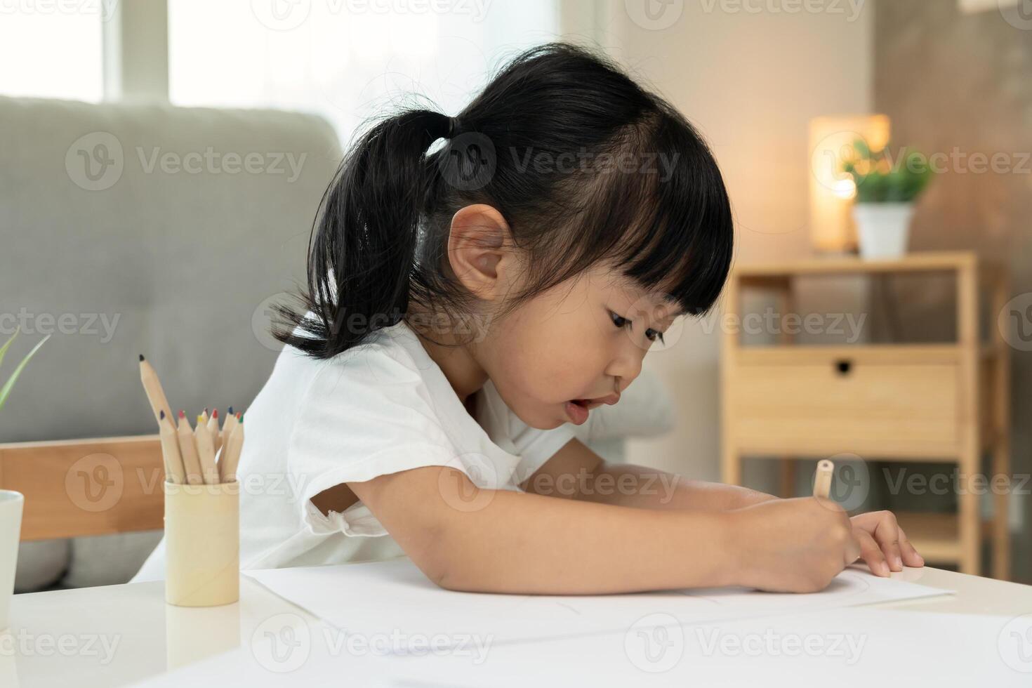 Happy Asia children learning and enjoy paint. family is happy and excited in the house. Mother and daughter having fun spending time together. Holiday, Activity, Executive Function, EQ photo
