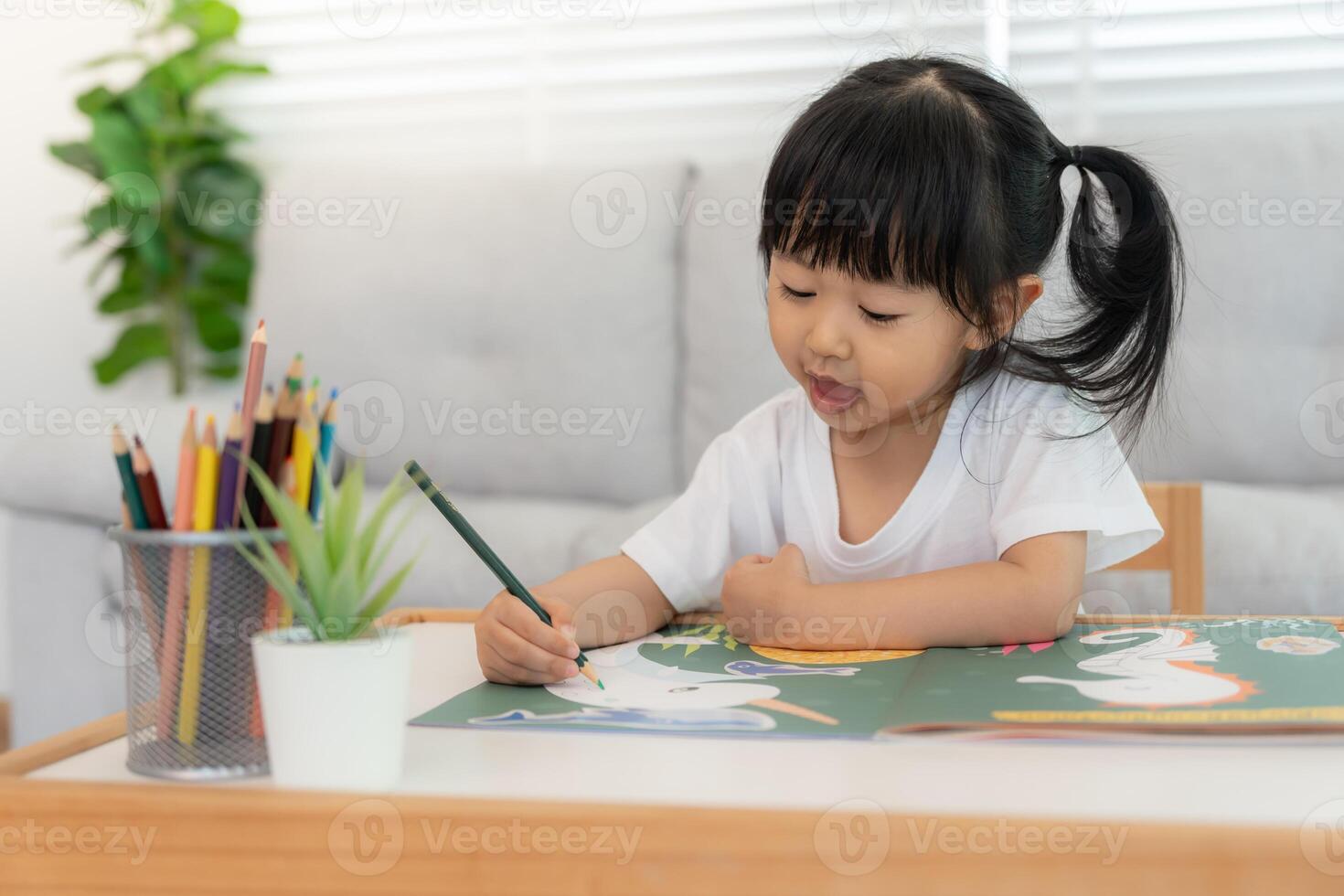 Happy Asia children playing learning paint on paper. Activity, development, IQ, EQ, meditation, brain, muscles, essential skills family having fun spending time together photo
