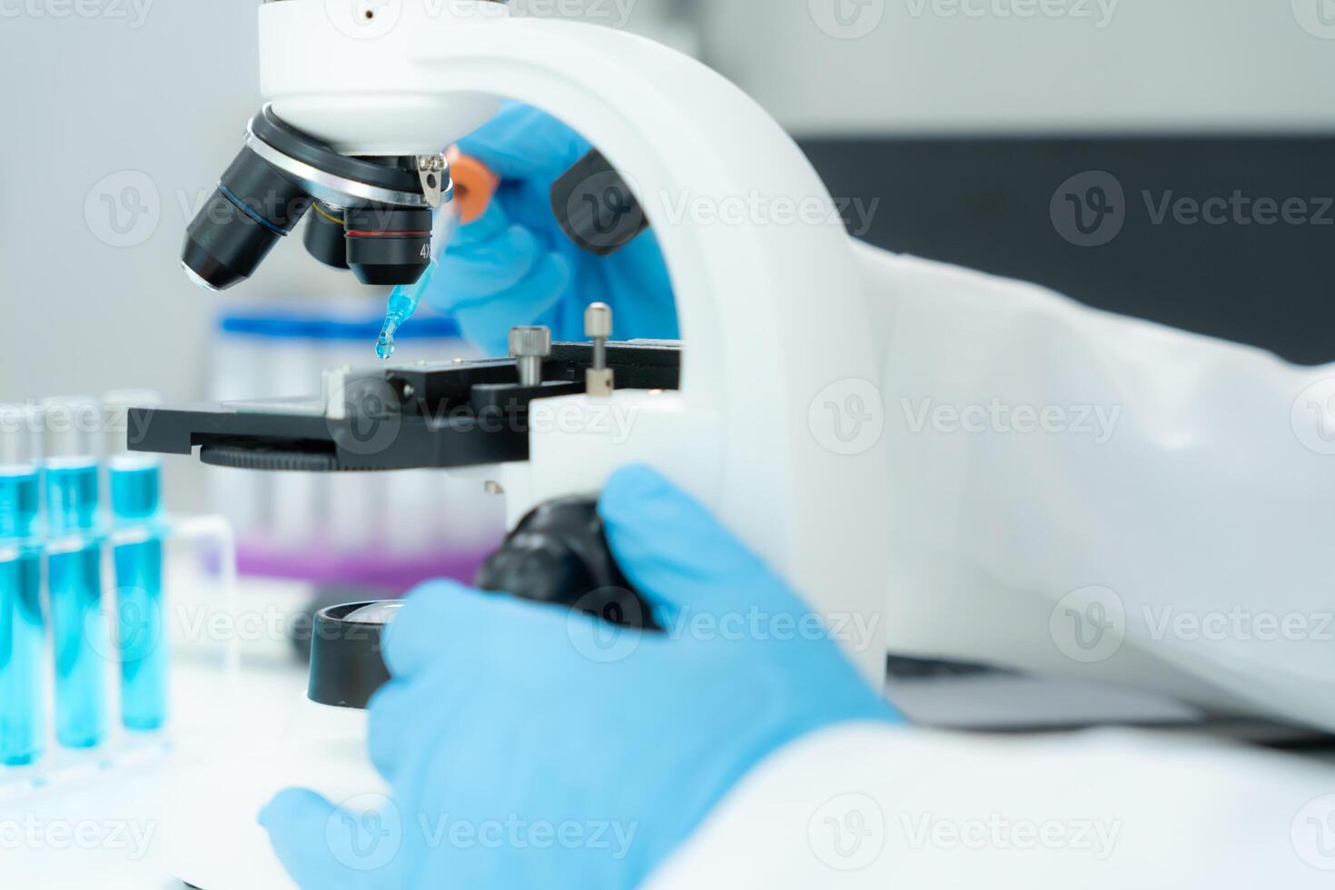 Scientist analyze biochemical samples in advanced scientific laboratory. Medical professional use microscope look microbiological developmental of viral. Biotechnology research in science lab, photo