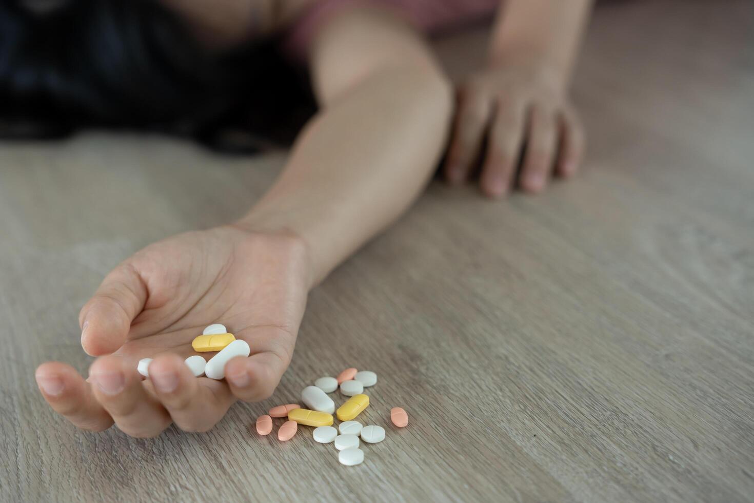 woman use pills overdose stressed, sad, drug abuser, drug addict, sick, unhealthy, unhappy, suicide, depressed or hopeless, Anti drug, drug addict, life and family problems, unmotivated photo