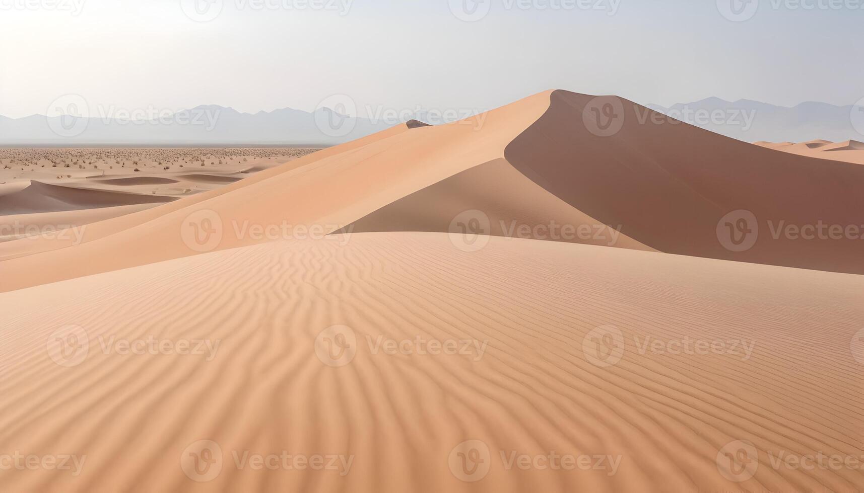 Desert Sand Dunes Landscape with Rolling Hills and Mountain Backdrop photo