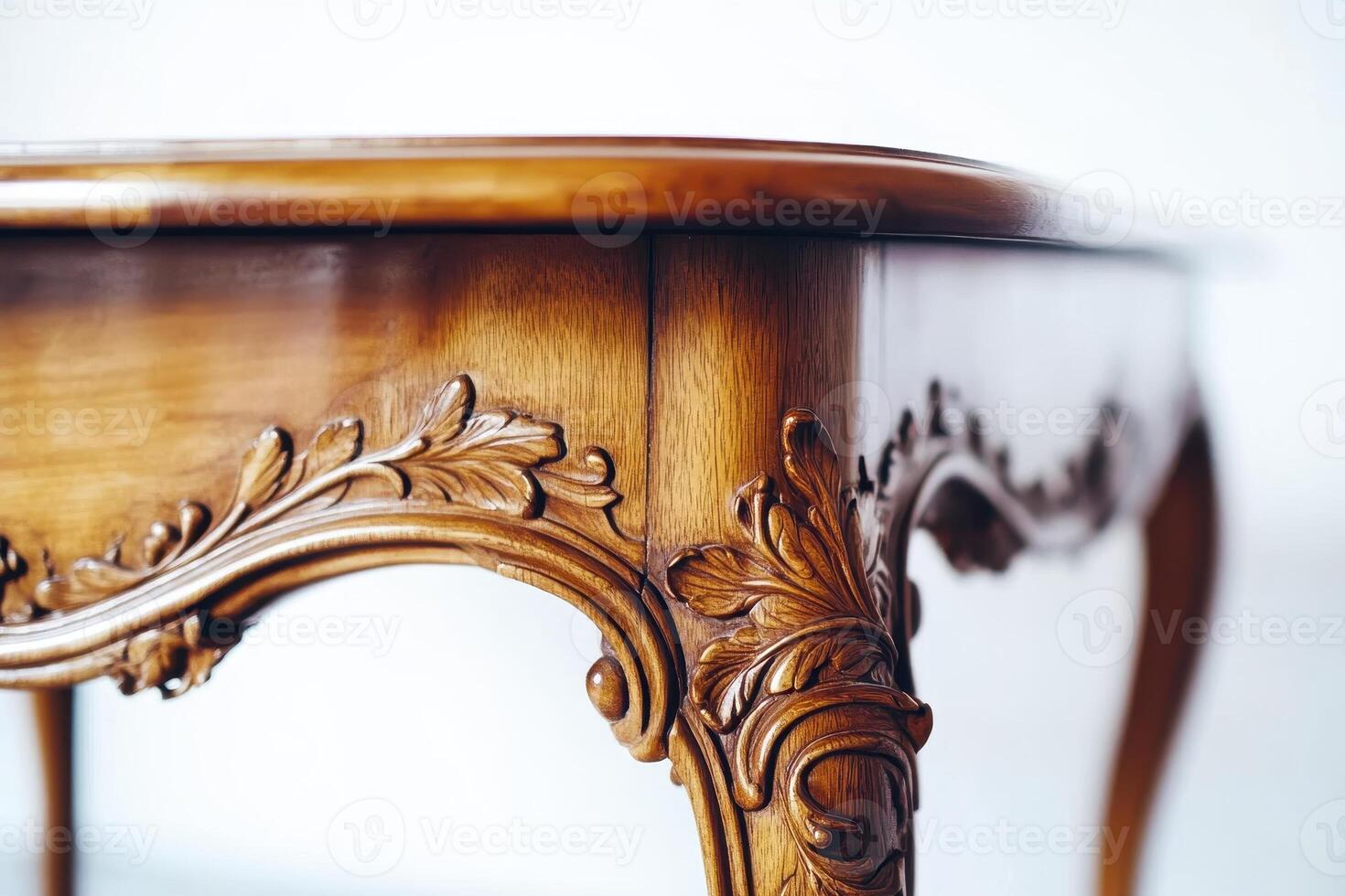 Intricate Carving Adorns Antique Wooden Table Leg photo