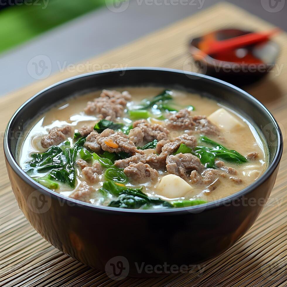 thai noodle soup with pork. Thai style noodle soup with pork and vegetable in brown bowl. photo