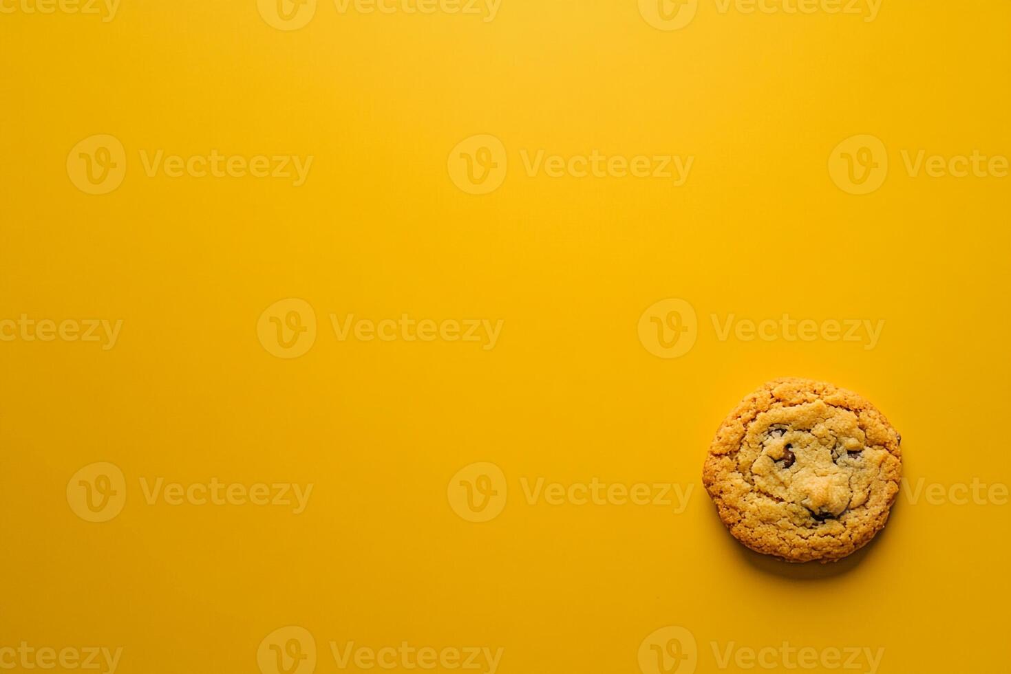 Top View Of Chocolate Chip Cookie On Vibrant Background With Copy Space, Food Setting photo