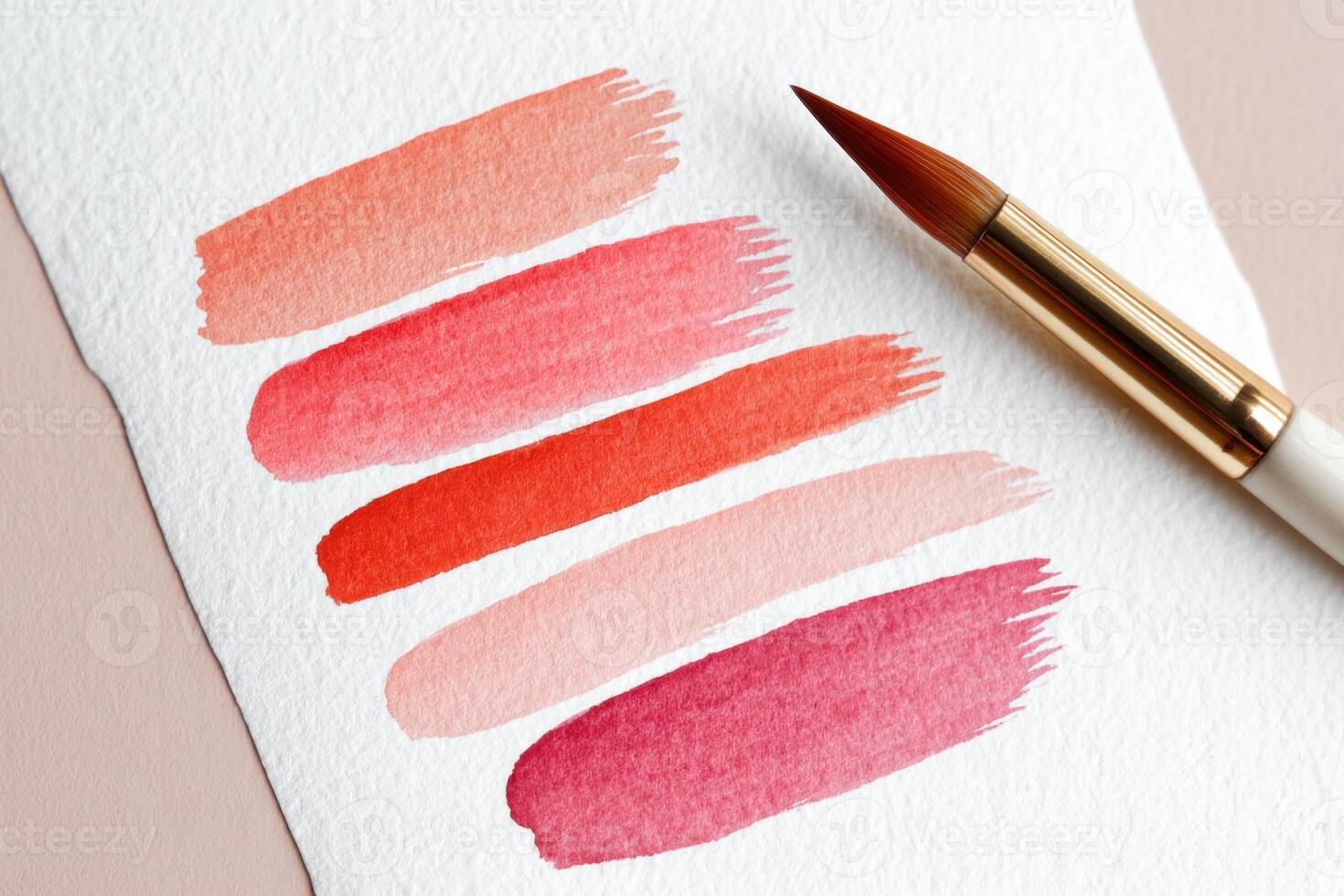 Colorful watercolor swatches arranged on textured paper with a paintbrush showcasing vibrant hues for artistic expression and creativity concept photo