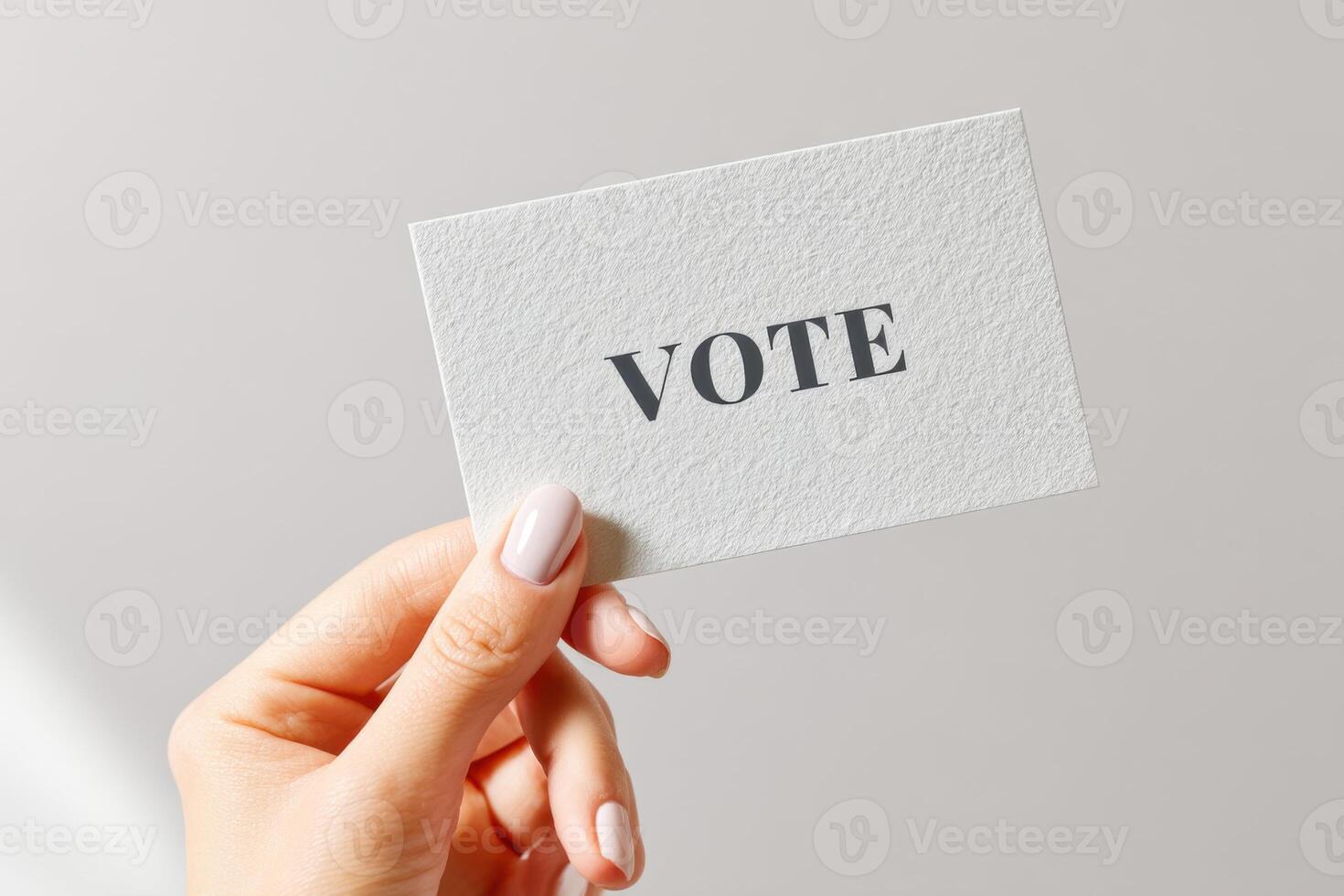 Vote card held in hand emphasizing civic duty and participation in democracy promoting engagement and awareness in electoral processes voting concept photo