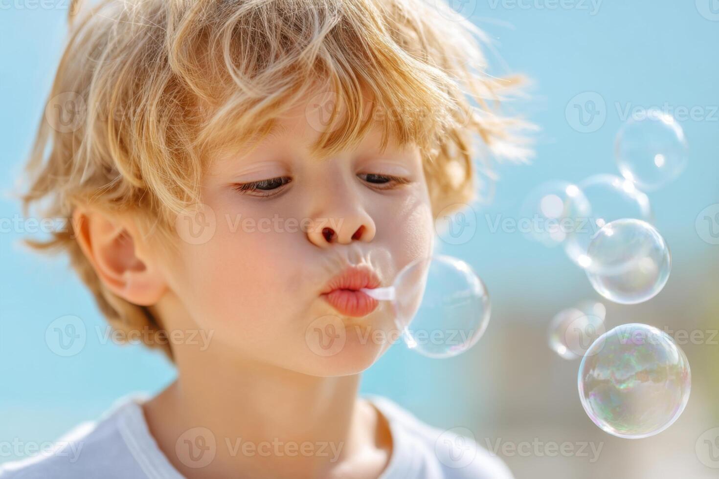 Child blowing bubbles in a sunny outdoor setting, capturing the joy and innocence of childhood playfulness, fun, and imagination, bubble play concept photo