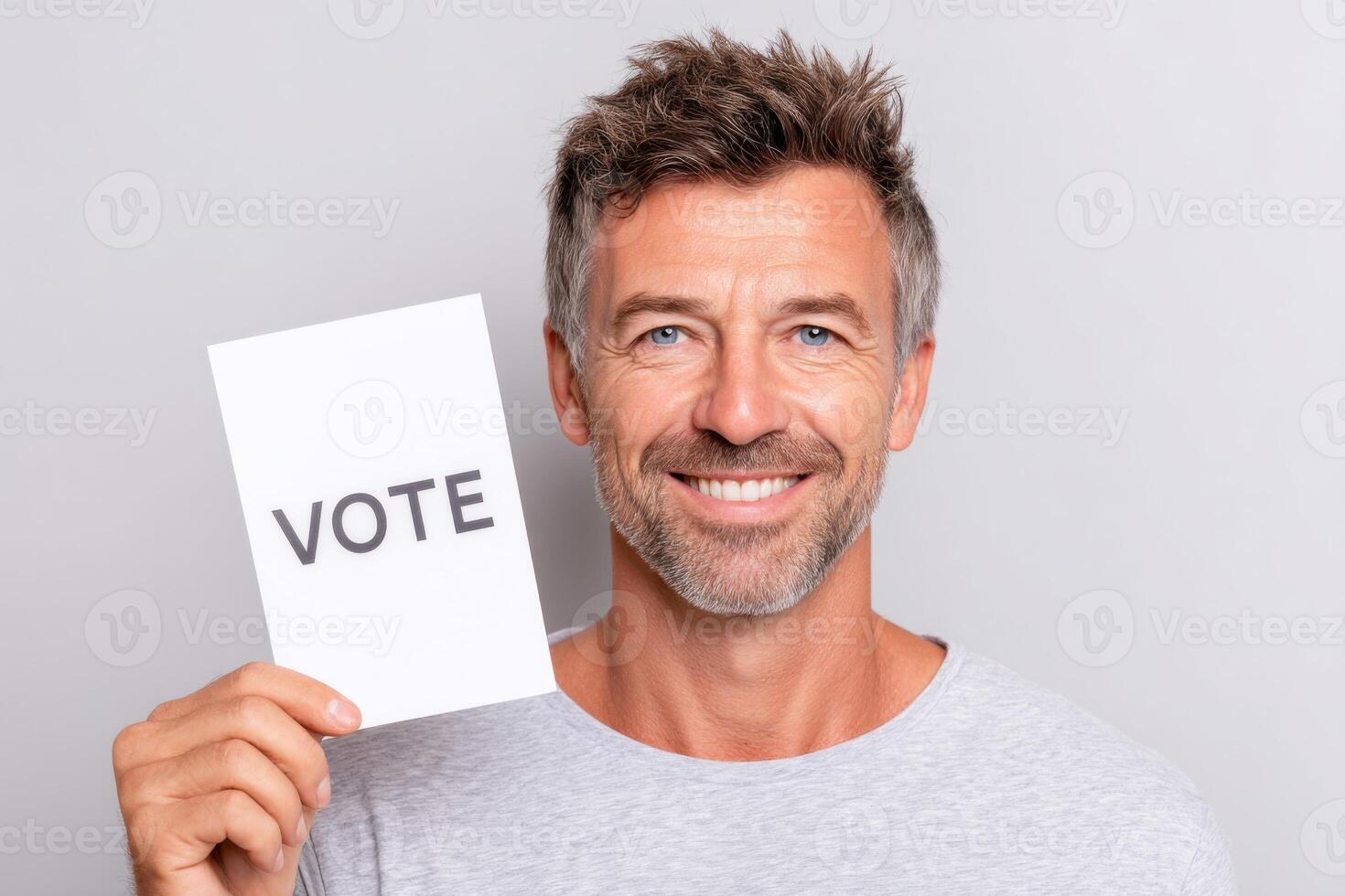 Engaging man holding a vote sign with a confident smile promoting civic participation and encouraging others to take part in the democratic process voting awareness concept photo