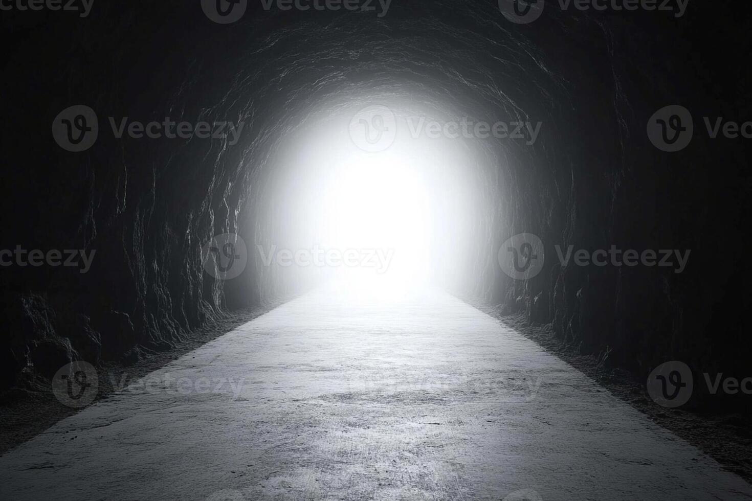 A tunnel with a light at the end photo