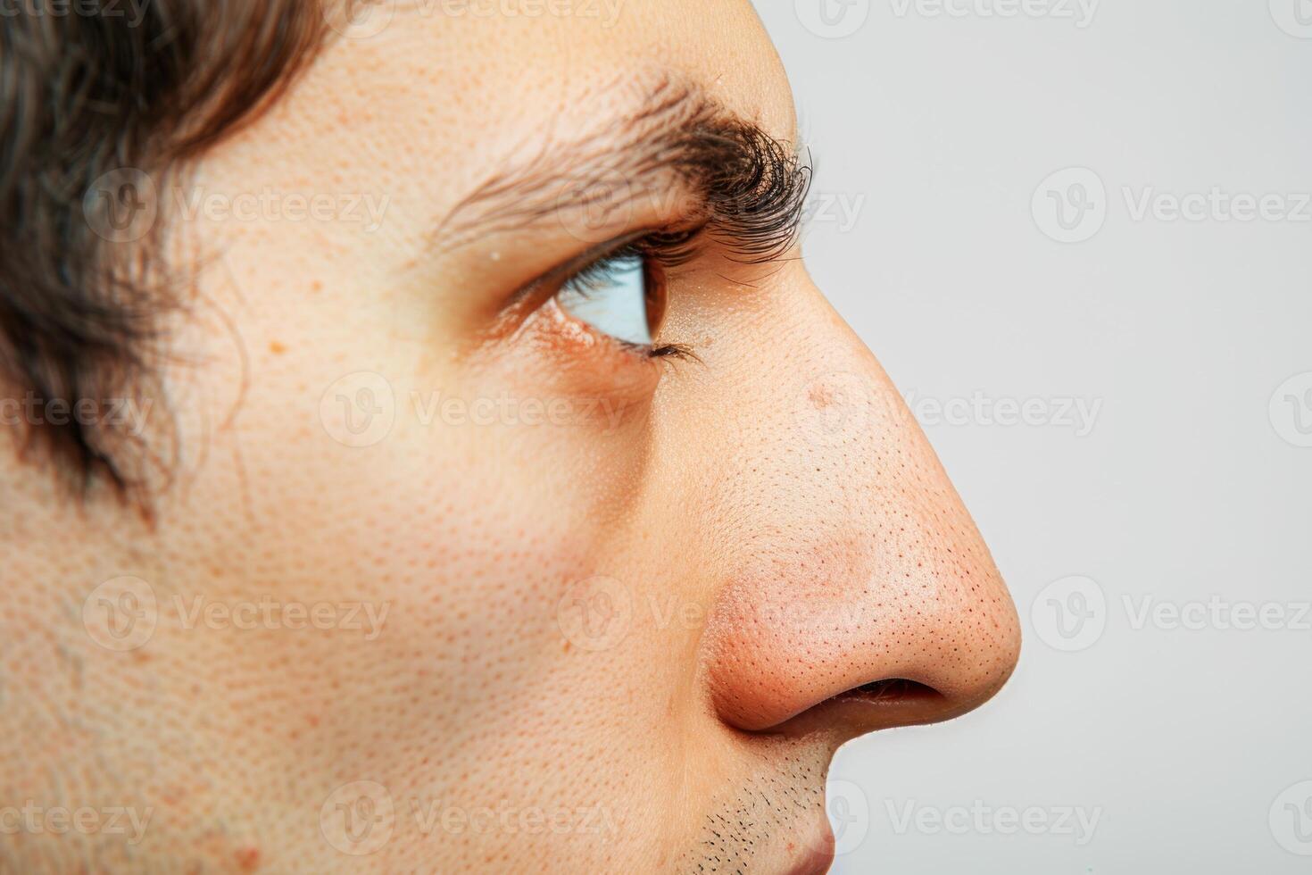 A man with a shaved head photo