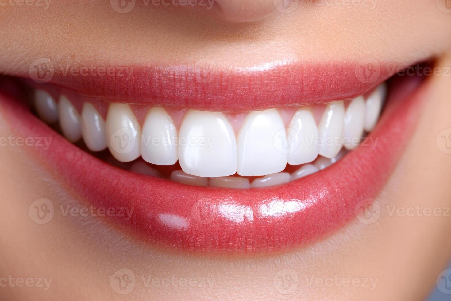 Close up of a smiling mouth showing healthy white teeth photo