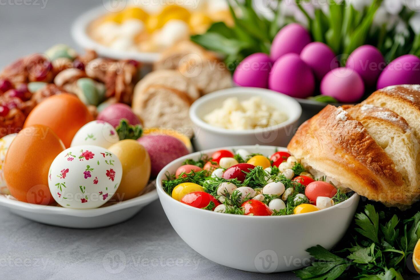Colorful easter eggs, fresh bread and festive salad creating a vibrant holiday spread photo