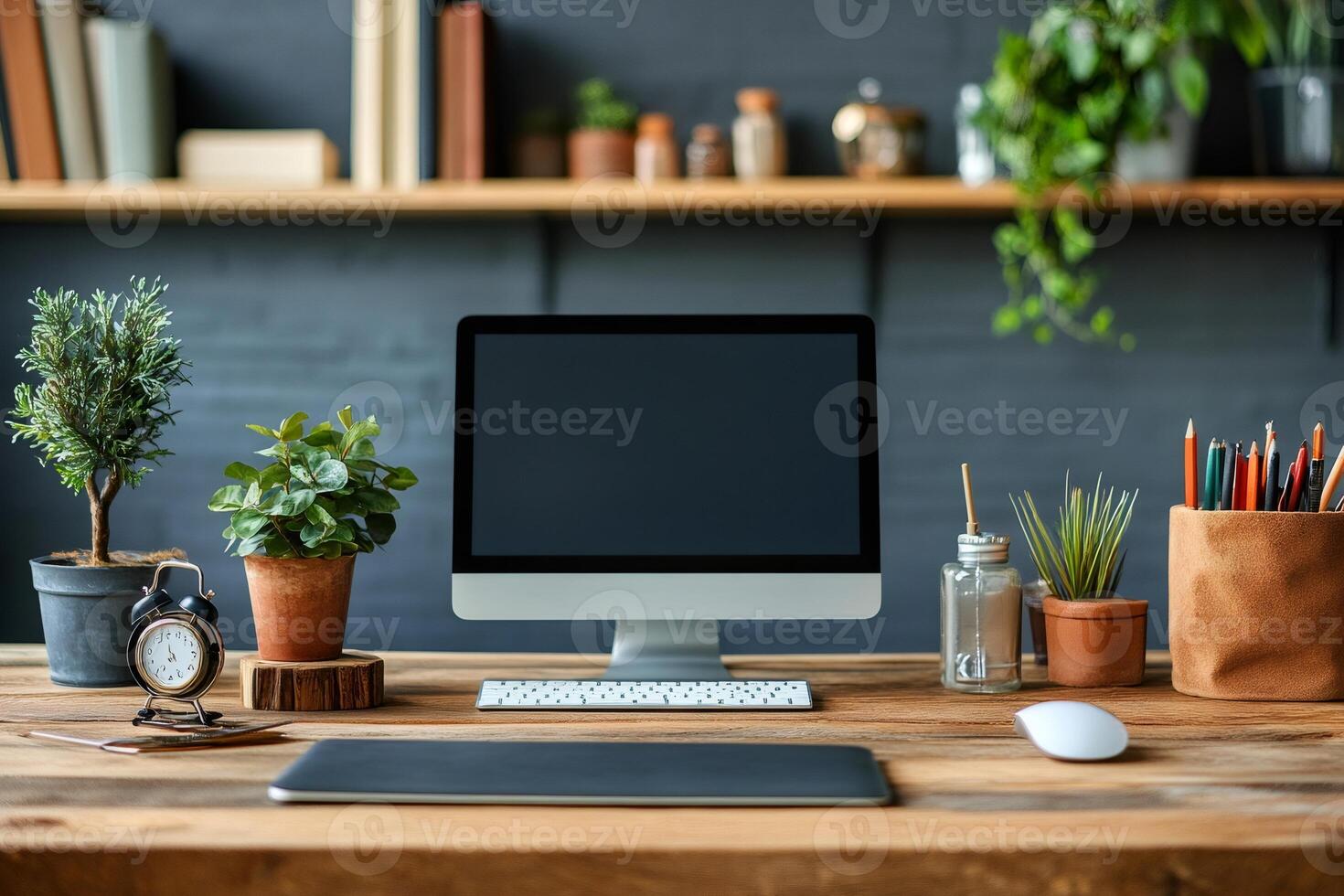 Modern freelancer workplace with computer showing blank screen for mockup photo