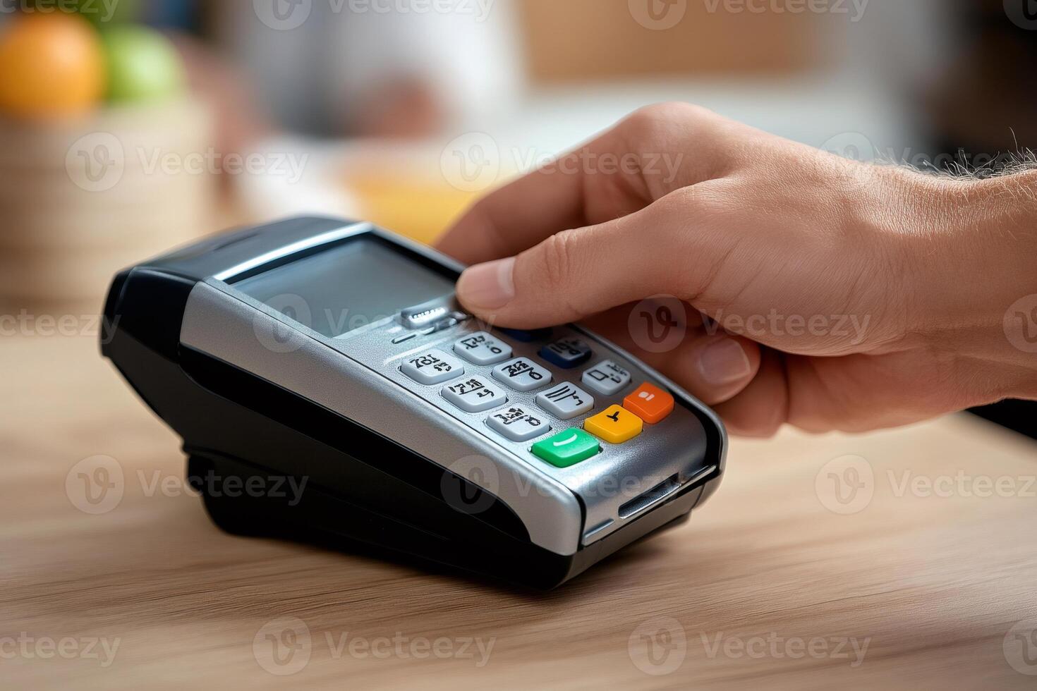 Customer paying with contactless payment terminal in a store photo