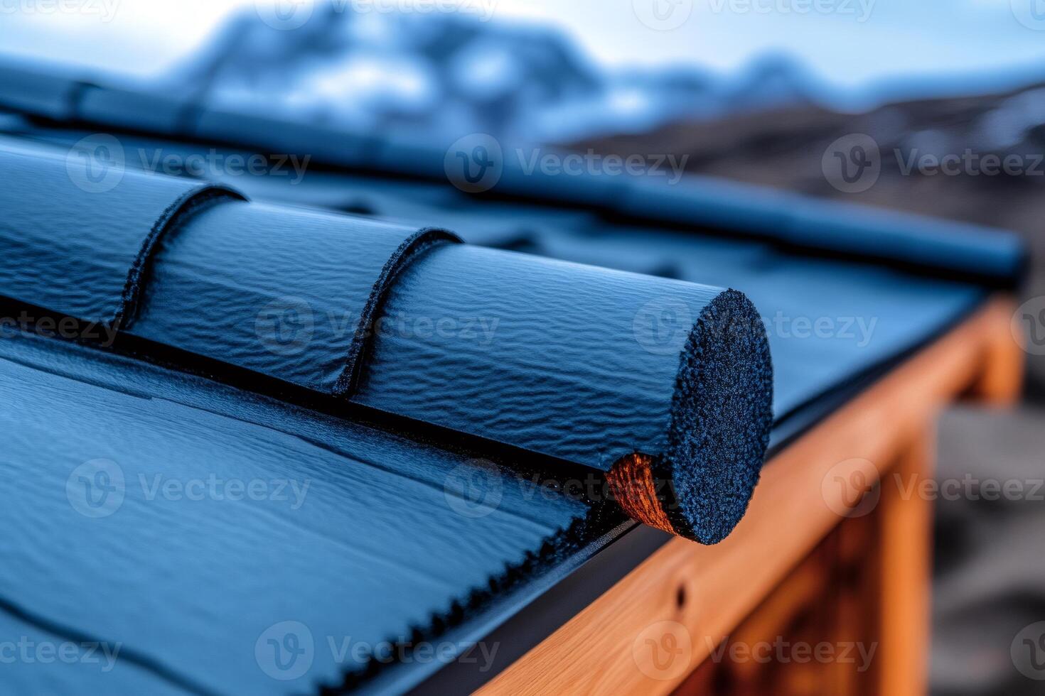 Close up of modern roofing tiles showing construction detail on wooden house photo