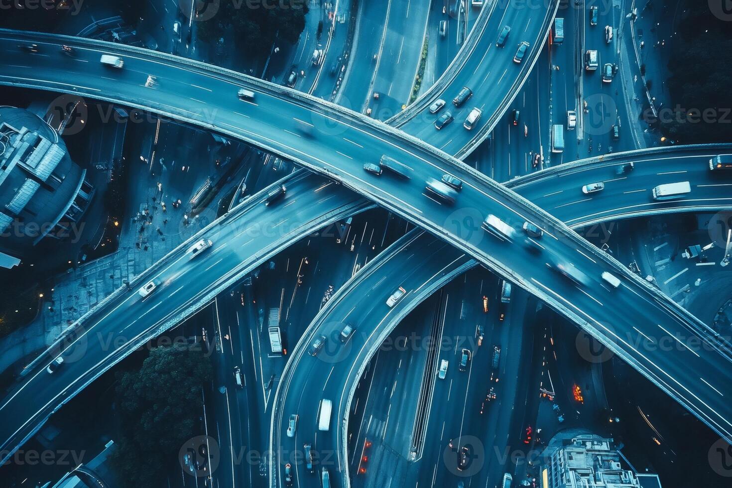 Highway intersection traffic flowing at dusk, aerial view photo