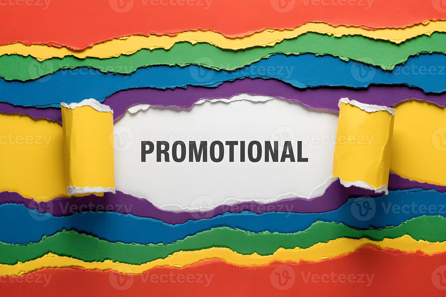Colorful torn paper revealing white background with the word promotional photo