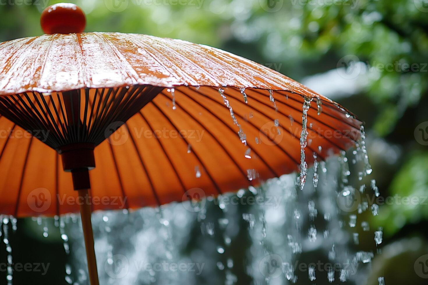 Traditional japanese umbrella protecting from rain in lush garden photo