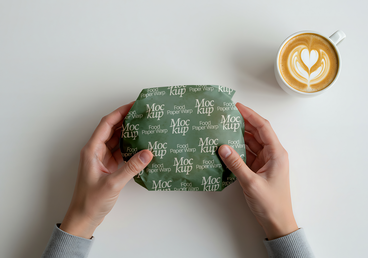 Hands delicately hold a food package wrapped in branded paper psd