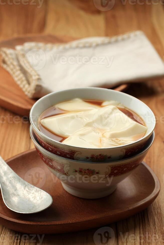 Wedang Tahu, Tofu Based Jelly Served with Warm Palm Sugar Syrup photo