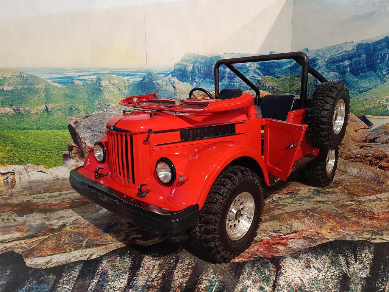 solo, central java - indonesia, april 22, 2025, Classic Red Mini Jeep Off Road Vehicle for Sale photo