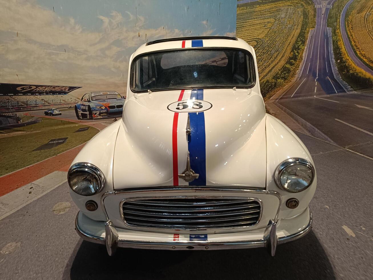 solo, central java - indonesia, april 22, 2025, Classic White Morris Minor Race Car Vintage Automobile photo