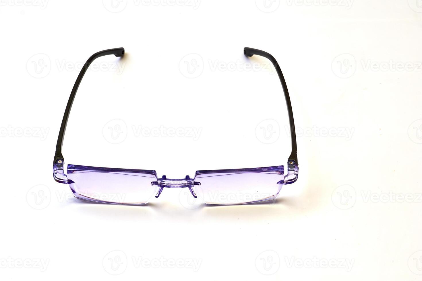 Just glasses to improve vision on white photo