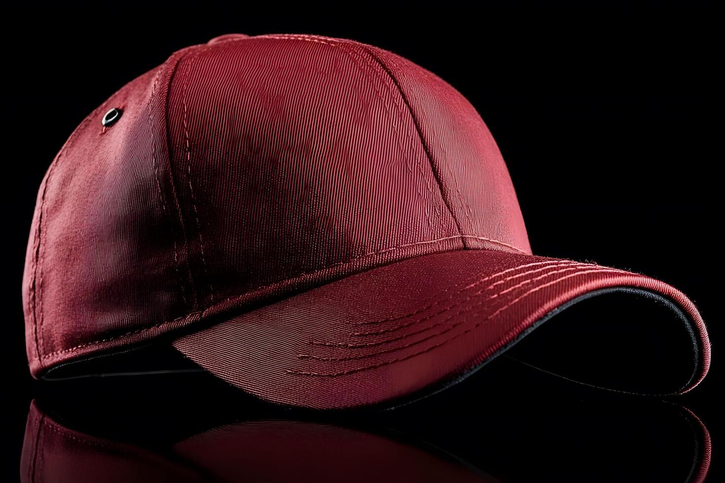 Stylish Red Baseball Cap on Black Background for Fashion and Sports Enthusiasts photo